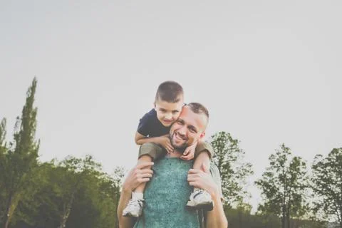 Dad with son having fun outside Stock Photos