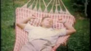 Dad Takes A Nap In The Backyard Hammock 1950S Vintage Film Home Movie 2497 Stock Footage