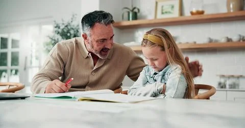 Dad, teaching and development with difficult child in home for academic cha.. Stock Photos