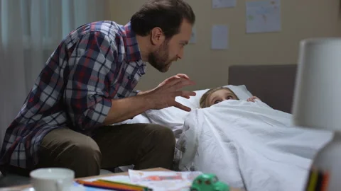 Dad telling scaring stories daughter, Stock Video Pond5