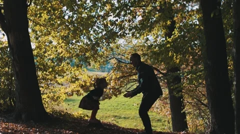 Dad throws daughter Stock Footage 56234412