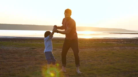 Dad turns his son 3 Stock Footage 108127777