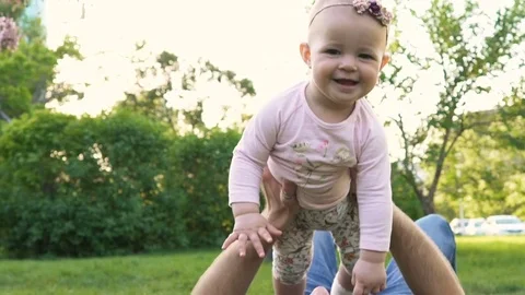 Daddy playing with sweety kid slow mo closeup Stock Footage 77895364