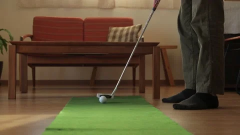 Daddy practicing putting at home. No face. Stock Footage 224905478