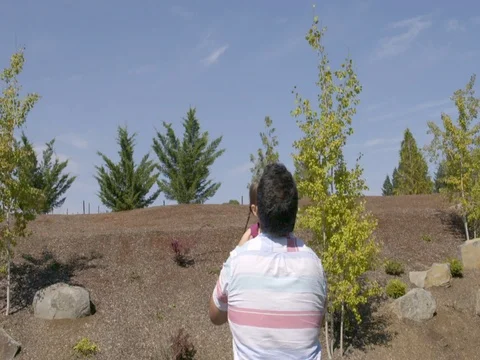 Daddy throws daughter in the sky and catches her slow motion 180fps HD Stock Footage