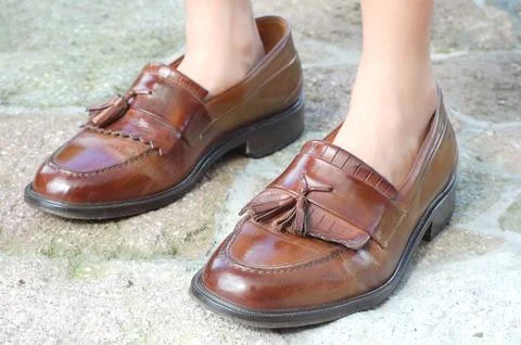 Daddy's shoes Stock Photos