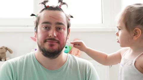 Dad's First Time Putting Makeup on His Daughter Goes Terribly Wrong in the Stock Footage 243605546