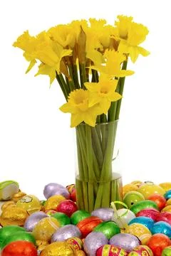 Daffodils and easter eggs Stock Photos