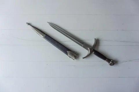 Dagger with holster on white background Foto stock