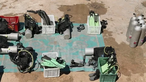 Dahab, Egypt - August 31, 2025: Panorama of scuba tanks and diving gear arranged 스톡 동영상 341451990