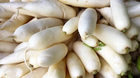 Daikon Radish Display at Vegetable Stock Footage 297876328