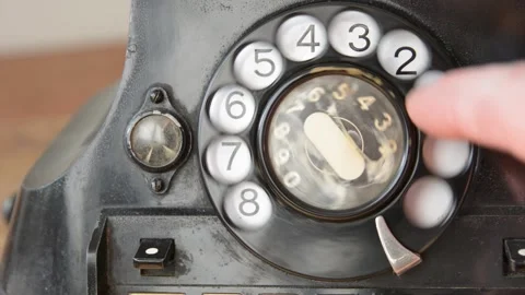 Dailing 311 on an old-fashioned rotary phone Stock Footage 149967870