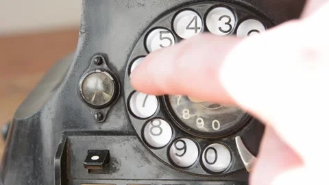 Dailing 611 on an old-fashioned rotary phone Stock Footage 149967857