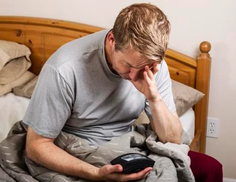 Daily boring wake up call for work Stock Photos