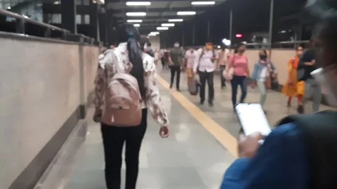 Daily Commuters walking inside metro station Stock Footage 151892407