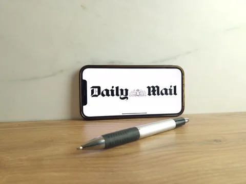 Daily Mail logo displayed on mobile phone Stock Photos