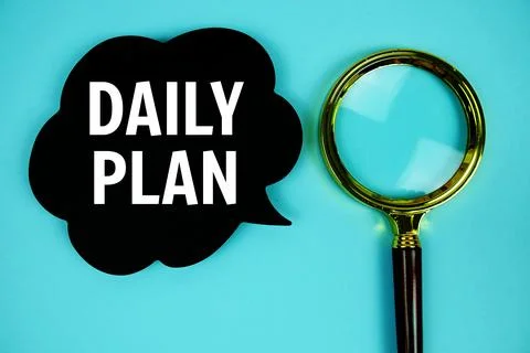 Daily Plan text with speech bubble and magnifying glass on blue background Stock Photos