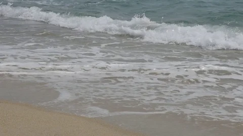 Daily scene of French coast with waves and wet sand video Stock Footage
