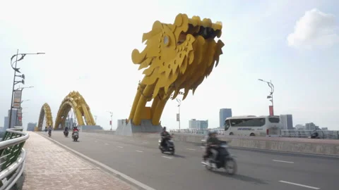 Daily traffic on the Dragon Bridge in Da Nang, Vietnam Stock Footage 88917401