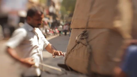 Daily wage workers carrying heavy load cargo, Mumbai, IndiaStock Footage