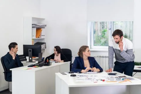 Daily work routine in a shared office Stock Photos