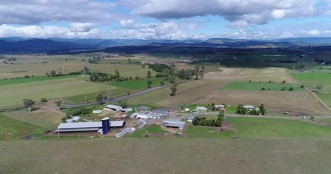 Dairy farm flyover Stock Footage 75430975