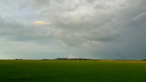 Dairy farm with rainbow Stock Footage 246149944