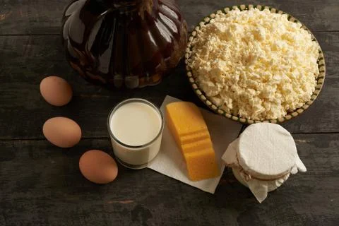 Dairy products and eggs on the table Stock Photos