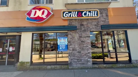 Dairy Queen Grill and Chill Restaurant Storefront Daytime Exterior Video stock 332414868