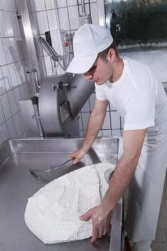 Dairymen, who prepare the mozzarella Stock Photos
