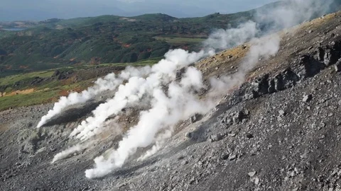 Daisetsuzan national park. Steam escaping from the volcanic vents in asahidake . Stock Footage