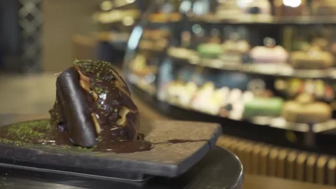 Daisy on a slice of chocolate cake Stock Footage 167589167