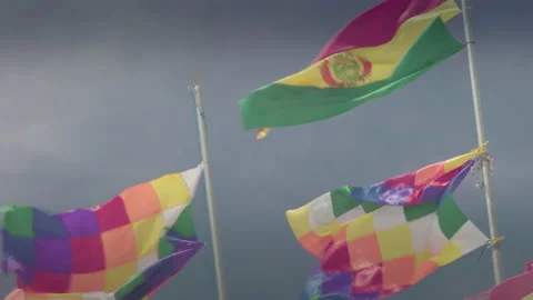 Dakar World Flags, as the Andes and Bolivian Flagss at Uyuni Salar, Bolivia. Stock Footage 136329430