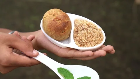 Dal Baati Also Know as Dal Bati or Daal Baati Churma. It is popular in Rajasthan Stock Footage 251020901