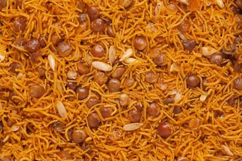 Dal Biji or Dal moth with roasted Masoor Dal (black lentils) and small besan sev Фото