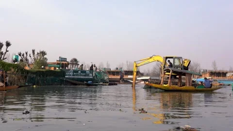 Dal Lake cleaning operations in full swing . Stock Footage 283232086