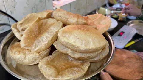 Dal puri being fried in an Indian kitchen Stock Footage 314151483