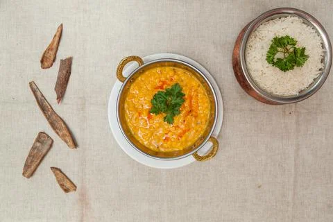 Dal tarka with plain rice served in a dish isolated on table top view of indi Stock Photos