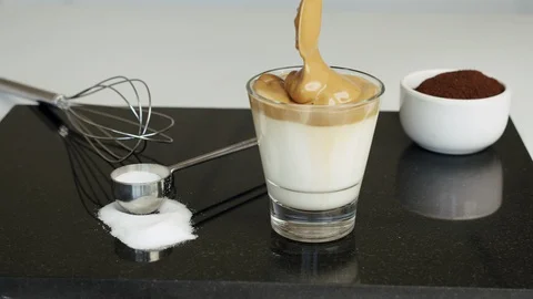Dalgona Whipped Coffee, Slow Motion Video stock 128710138