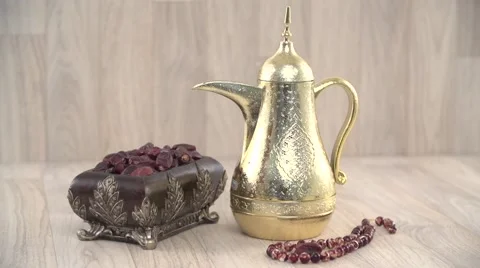 Dallah with dates and beads. Stock Footage 54484944