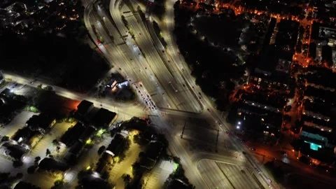 Dallas Freeway Lights and the Distant Downtown Skyline after Dark Stock Footage 343068448