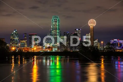 Dallas Skyline Reflecting In Water At Night