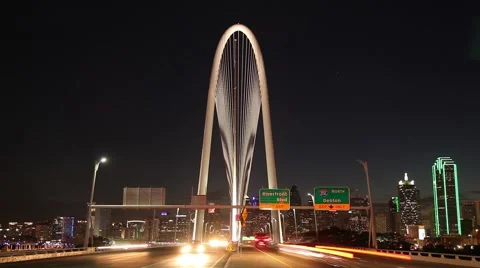 Dallas skyline Time-lapse night w/ Margaret Hunt Hill Bridge traffic streaking  Stock Footage