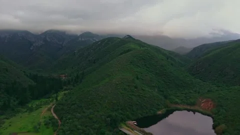 Dam and mist-covered mountains, cinematic aerial, Western Cape Stock Footage 342335147