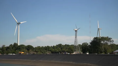 Dam and windmill on blue sky background 動画素材 219814968