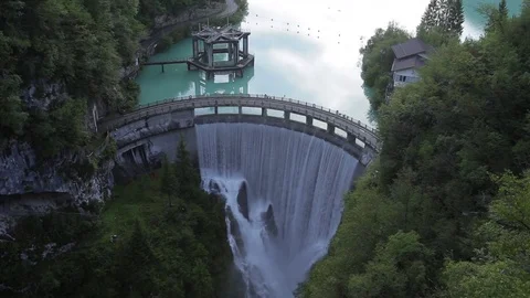 Dam on the Barcis lake at sunset Stock Footage 78017717