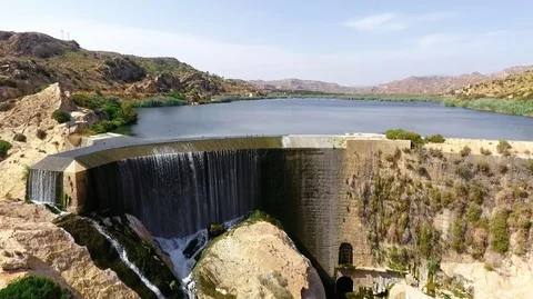 Dam in the city of Elche. First arched dam aerial view. Elche Spain Stock Footage 128603944