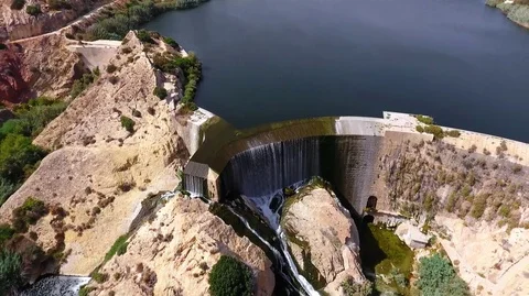 Dam in the city of Elche. First arched dam aerial view. Pantano de Elche 2K Stock Footage 128603947