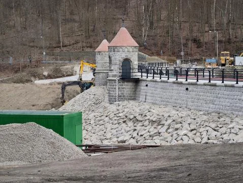 Dam Construction Progressing. Construction Site With Machinery Improving Fl.. Stock Photos