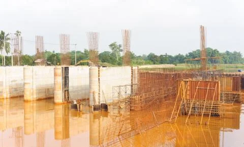 Dam construction site after rainstorm. Stock Photos